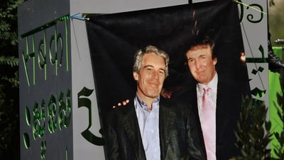 A banner of Jeffrey Epstein and President Donald Trump displayed during a protest earlier this year. (REUTERS)