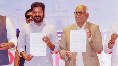 Vice-presidential candidate Justice (retired) B Sudershan Reddy with Telangana chief minister A Revanth Reddy. (ANI)