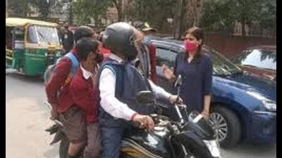 Volunteers to guide traffic near schools, counsel on helmets, belts, assist pedestrians, and flag accident-prone spots (Sourced) Volunteers to guide traffic near schools, counsel on helmets, belts, assist pedestrians, and flag accident-prone spots (Sourced)