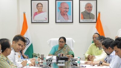 Delhi chief minister Rekha Gupta, with husband Manish Gupta seated on her left, during an official meeting. (X-@gupta_rekha)