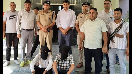 The accused in police custody on Monday. (HT)