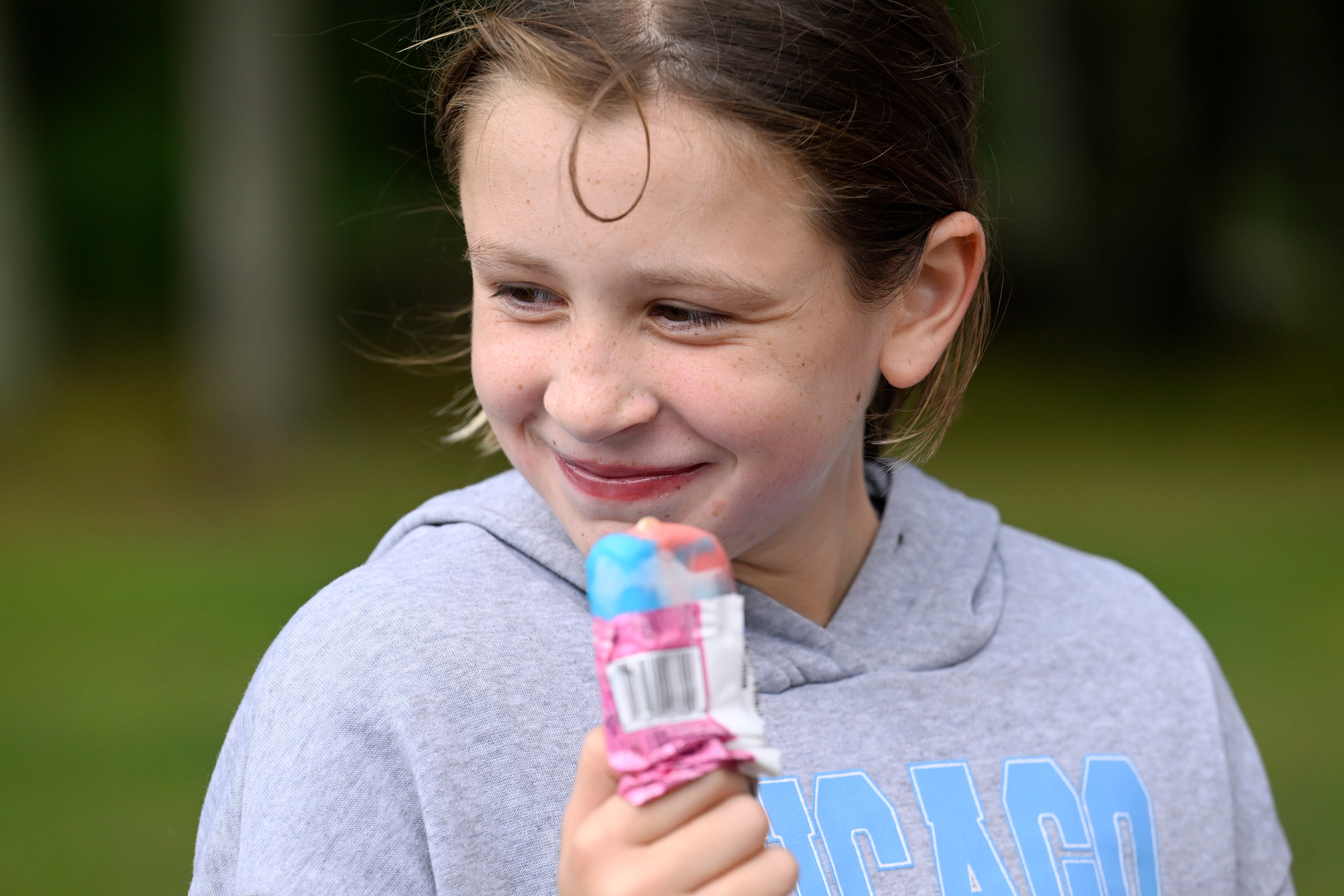 Rozzy Constant enjoys an ice cream from the Norwich Police Department Ice Cream truck in Norwich. (Jessica Hill/AP) Rozzy Constant enjoys an ice cream from the Norwich Police Department Ice Cream truck in Norwich. (Jessica Hill/AP)