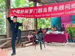 In this undated handout photo released by the Royal Solomon Islands Police Force, a member of the Chinese Police Liaison Team performs during a ‘community engagement event’ in the capital of Honiara, in the Pacific nation of Solomon Islands. In this undated handout photo released by the Royal Solomon Islands Police Force, a member of the Chinese Police Liaison Team performs during a ‘community engagement event’ in the capital of Honiara, in the Pacific nation of Solomon Islands.