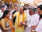 Delhi Chief Minister Rekha Gupta's husband, Manish Gupta applies tilak on her forehead during their visit to Har Ki Pauri, in Haridwar. (ANI) Delhi Chief Minister Rekha Gupta's husband, Manish Gupta applies tilak on her forehead during their visit to Har Ki Pauri, in Haridwar. (ANI)