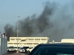 Smoke rises after several blasts were heard in Doha, Qatar, September 9, 2025. REUTERS/Ibraheem Abu Mustafa