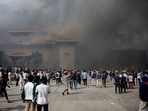 Smoke rises from the Parliament complex following fire set up during a protest against Monday's killing of 19 people after anti-corruption protests.