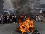 Demonstrators shout slogans as they gather to protest against Monday's killing of 19 people after anti-corruption protests that were triggered by a social media ban which was later lifted.