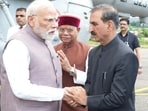 Prime Minister Narendra Modi being received by chief minister Sukhvinder Singh Sukhu at the Gaggal airport in Kangra on Tuesday. Governor Shiv Pratap Shukla is also seen. (HT Photo) Prime Minister Narendra Modi being received by chief minister Sukhvinder Singh Sukhu at the Gaggal airport in Kangra on Tuesday. Governor Shiv Pratap Shukla is also seen. (HT Photo)