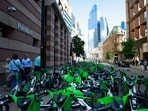 Public rental bikes, operated by Lime, are parked on a street during a strike by Tube workers in London.