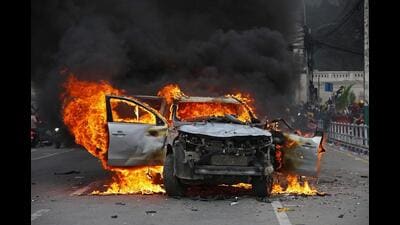 A car burns outside the Singha Durbar, the main administrative building of the Nepal government, in Kathmandu on September 9, 2025. (AFP Photo) A car burns outside the Singha Durbar, the main administrative building of the Nepal government, in Kathmandu on September 9, 2025. (AFP Photo)