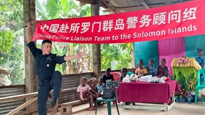 In this undated handout photo released by the Royal Solomon Islands Police Force, a member of the Chinese Police Liaison Team performs during a ‘community engagement event’ in the capital of Honiara, in the Pacific nation of Solomon Islands. (Via AFP) In this undated handout photo released by the Royal Solomon Islands Police Force, a member of the Chinese Police Liaison Team performs during a ‘community engagement event’ in the capital of Honiara, in the Pacific nation of Solomon Islands. (Via AFP)