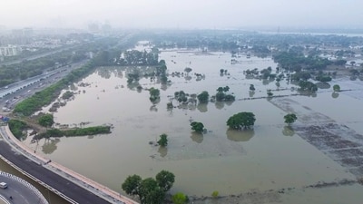 As the Yamuna level continues to decline, people have started shovelling out mud and silt from their homes that were inundated. (ANI video Grab) As the Yamuna level continues to decline, people have started shovelling out mud and silt from their homes that were inundated. (ANI video Grab)
