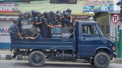 Policemen in riot gear patrol in a vehicle during curfew orders in Kathmandu, Nepal, Tuesday, Sept. 9, 2025. (AP Photo/Niranjan Shrestha) (AP) Policemen in riot gear patrol in a vehicle during curfew orders in Kathmandu, Nepal, Tuesday, Sept. 9, 2025. (AP Photo/Niranjan Shrestha) (AP)