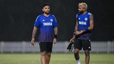 India's Hardik Pandya (R) speaks with his captain Suryakumar Yadav during a practice session ahead of Asia Cup. (AFP) India's Hardik Pandya (R) speaks with his captain Suryakumar Yadav during a practice session ahead of Asia Cup. (AFP)