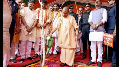 Chief minister Yogi Adityanath waters a sapling during the foundation stone laying ceremony of Saraswati Shishu Mandir, in Basti. (Handout via PTI Photo) Chief minister Yogi Adityanath waters a sapling during the foundation stone laying ceremony of Saraswati Shishu Mandir, in Basti. (Handout via PTI Photo)