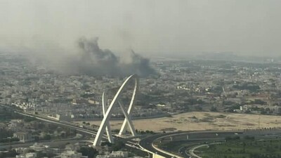 Smoke was seen rising over the Katara District in Doha. Smoke was seen rising over the Katara District in Doha.