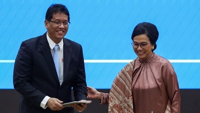 While new finance minister Purbaya Yudhi Sadewa said he will keep Indonesia fiscally healthy, Indrawati (R) enjoyed widespread respect among global investors. (Reuters)