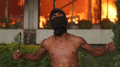 A demonstrator reacts at the Parliament complex during a protest against Monday's killing of 19 people after anti-corruption protests that were triggered by a social media ban. (REUTERS)