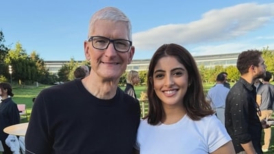Apple CEO Tim Cook (L) with Navya Naveli Nanda in California. Apple CEO Tim Cook (L) with Navya Naveli Nanda in California.