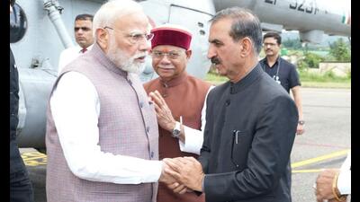 Prime Minister Narendra Modi being received by chief minister Sukhvinder Singh Sukhu at the Gaggal airport in Kangra on Tuesday. Governor Shiv Pratap Shukla is also seen. (HT Photo) Prime Minister Narendra Modi being received by chief minister Sukhvinder Singh Sukhu at the Gaggal airport in Kangra on Tuesday. Governor Shiv Pratap Shukla is also seen. (HT Photo)