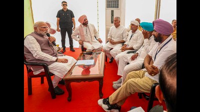 Prime Minister Narendra Modi interacting with flood-affected people in Gurdaspur. (PTI) Prime Minister Narendra Modi interacting with flood-affected people in Gurdaspur. (PTI)
