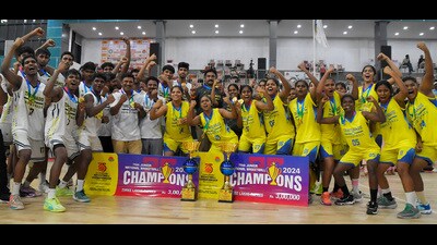 The boys and girls teams of Tamil Nadu celebrating after clinching the title of 75th Junior National Basketball Championship at Guru Nanak Stadium in Ludhiana on Tuesday. (Manish/HT) The boys and girls teams of Tamil Nadu celebrating after clinching the title of 75th Junior National Basketball Championship at Guru Nanak Stadium in Ludhiana on Tuesday. (Manish/HT)