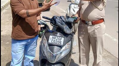 The impounded scooter that had pending challans worth ₹2.06 lakh in Gurugram. (HT Photo) The impounded scooter that had pending challans worth ₹2.06 lakh in Gurugram. (HT Photo)
