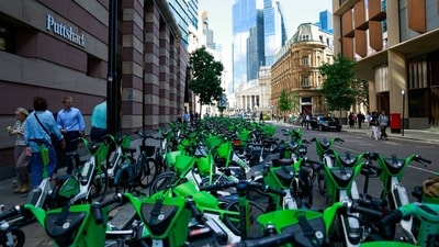 Public rental bikes, operated by Lime, are parked on a street during a strike by Tube workers in London. (Bloomberg)