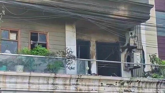 A view of damaged house as fire breaks out at Greenfield colony, claiming 3 lives, in Faridabad on Monday (ANI Video Grab)
