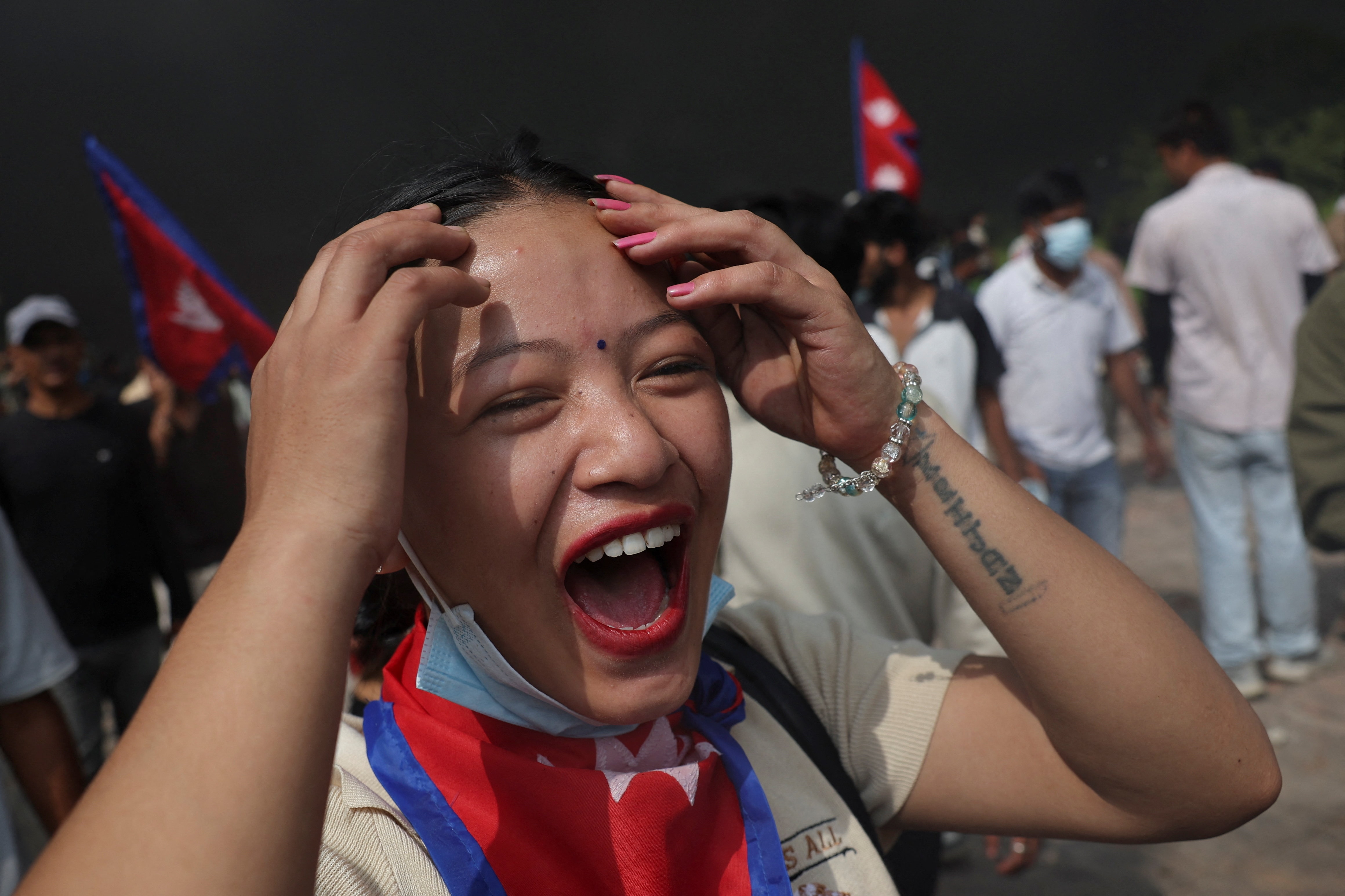 A demonstrator reacts at the Parliament complex during a protest against Monday’s killing of 19 people after anti-corruption protests that were triggered by a social media ban, which was later lifted, during a curfew in Kathmandu (REUTERS) A demonstrator reacts at the Parliament complex during a protest against Monday’s killing of 19 people after anti-corruption protests that were triggered by a social media ban, which was later lifted, during a curfew in Kathmandu (REUTERS)
