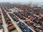 FILE - Shipping containers are seen ready for transport at the Guangzhou Port in the Nansha district in southern China's Guangdong province FILE - Shipping containers are seen ready for transport at the Guangzhou Port in the Nansha district in southern China's Guangdong province