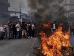 Demonstrators shout slogans as they gather to protest against Monday’s killing of 19 people after anti-corruption protests that were triggered by a social media ban which was later lifted. (REUTERS)