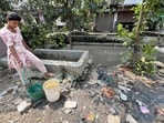 Dhoka Mohalla streets are covered with garbage and filth left by the overflowing Buddha Nullah in Ludhiana on Wednesday. (Gurpreet Singh/HT)