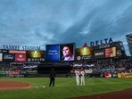 A general view of the main scoreboard at Yankee Stadium during a moment of silence for Charlie Kirk before the game 