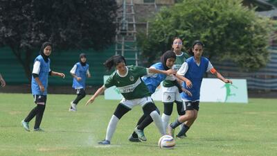 Comrade FC (blue bib) in action against Kashmir Arrows at the RFYS Kashmir U-19 girls tournament. (RFYS)