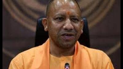 During the Janata Darshan at Gorakhnath temple on Wednesday, a woman complained about local bullies occupying her land. T (Sourced)