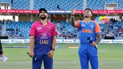Indian captain Suryakumar Yadav flips the coin at the toss alongside UAE's Muhammad Waseem. Indian captain Suryakumar Yadav flips the coin at the toss alongside UAE's Muhammad Waseem.
