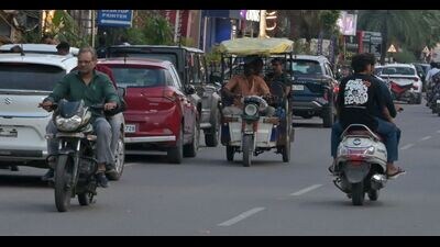 Helmet-less two-wheeler riders on Prayagraj roads on Wednesday. (Anil Kumar Maurya/HT) Helmet-less two-wheeler riders on Prayagraj roads on Wednesday. (Anil Kumar Maurya/HT)