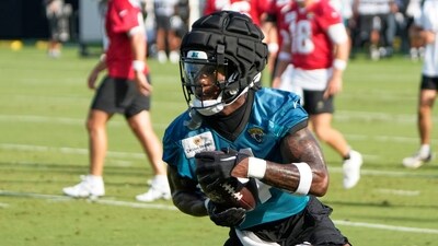 Jacksonville Jaguars running back Tank Bigsby runs after a reception during practice at the team's NFL football training camp. (AP Photo/John Raoux) (AP)