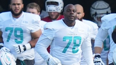 Miami Dolphins guard James Daniels (78) runs onto the field during practice at the NFL football team's training camp, (AP) Miami Dolphins guard James Daniels (78) runs onto the field during practice at the NFL football team's training camp, (AP)