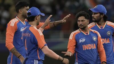 Kuldeep Yadav, second right, celebrates the wicket of UAE's Rahul Chopra during the Asia Cup on Wednesday. (AP) Kuldeep Yadav, second right, celebrates the wicket of UAE's Rahul Chopra during the Asia Cup on Wednesday. (AP)