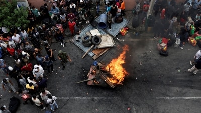 Prisoners burn furniture and other items outside the Dilli Bazaar jail as they try to breakout, following protests against Monday's killing of 19 people after anti-corruption protests triggered by a social media ban which was later lifted, in Kathmandu, Nepal, September 10 (REUTERS)