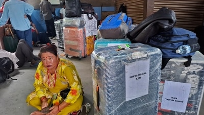 Stranded passengers wait as operations remain halted at the Tribhuvan International airport in Kathmandu on September 10, 2025. (AFP)