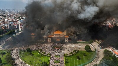 An aerial view of smoke rising from the Federal Parliament of Nepal premises after it was set on fire by protestors during massive anti-government protests, in Kathmandu. (PTI) An aerial view of smoke rising from the Federal Parliament of Nepal premises after it was set on fire by protestors during massive anti-government protests, in Kathmandu. (PTI)