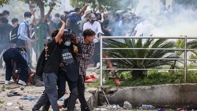 A demonstrator shouts slogans during a protest outside the Parliament in Kathmandu on September 8, 2025, condemning social media prohibitions and corruption by the government. (Prabin Ranabhat/AFP)