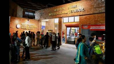 Passengers gather at an entrance of Tribhuvan International Airport after it reopened in Kathmandu on September 10, 2025, following a closure due to civil unrest in Nepal's capital. (AFP) Passengers gather at an entrance of Tribhuvan International Airport after it reopened in Kathmandu on September 10, 2025, following a closure due to civil unrest in Nepal's capital. (AFP)