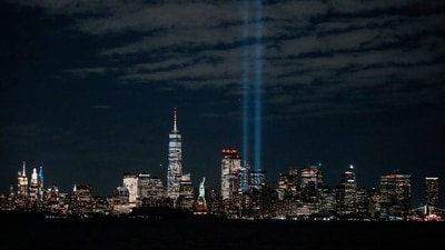 The Tribute in Light installation is illuminated over the lower Manhattan skyline during the testing process before the 24th anniversary of the September 11, 2001, attacks on the World Trade Center, as viewed from Bayonne, New Jersey, U.S. September 9, 2025. REUTERS/Eduardo Munoz (REUTERS)