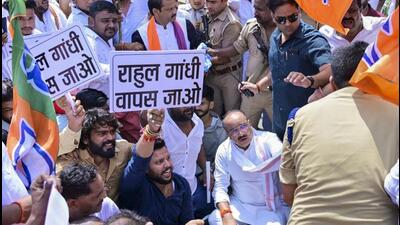 Uttar Pradesh minister Dinesh Pratap Singh stages a protest on the Lucknow-Prayagraj highway. (PTI PHOTO) Uttar Pradesh minister Dinesh Pratap Singh stages a protest on the Lucknow-Prayagraj highway. (PTI PHOTO)