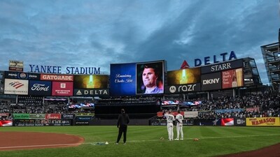 A general view of the main scoreboard at Yankee Stadium during a moment of silence for Charlie Kirk before the game (IMAGN IMAGES via Reuters Connect)