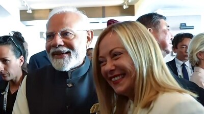 Prime Minister Narendra Modi and Italian Prime Minister Giorgia Meloni on the sidelines of the 51st G7 Summit (DD/ANI Grab) Prime Minister Narendra Modi and Italian Prime Minister Giorgia Meloni on the sidelines of the 51st G7 Summit (DD/ANI Grab)
